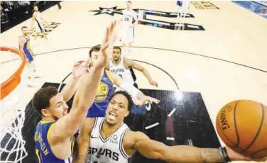  ?? Reuters ?? ↑ San Antonio Spurs’ Demar Derozan (10) in action against Golden State Warriors during their NBA game at the AT&amp;T Center on Monday.