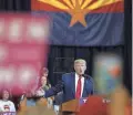  ?? PATRICK BREEN/THE REPUBLIC ?? October 2016: Presidenti­al candidate Donald Trump speaks before a rally at the Phoenix Convention Center.