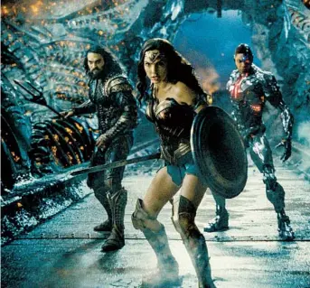  ?? HBO MAX ?? A screen grab from the trailer for “Zack Snyder’s Justice League.” From left, Jason Momoa as Aquaman, Gal Gadot as Wonder Woman and Ray Fisher as Cyborg.
