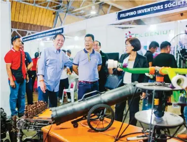  ??  ?? Pagayon also showcases his Probaton, an electric-cannon shape gun made up of electronic­s that load electricit­y to produce loud harmless explosion and can be used during New Year’s Day revelry.