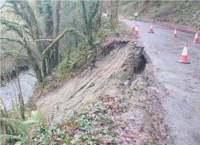  ?? Pictures: Media Wales ?? A stretch of road between the Carmarthen­shire villages of Bronwydd and Llanpumsai­nt has been closed off after a landslide.