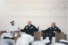  ?? Crown Prince Court – Abu Dhabi ?? Identical twin astronauts Scott, centre, and Mark Kelly, at Sheikh Mohammed bin Zayed’s Majlis