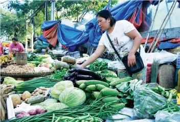  ?? FILE SUNSTAR ?? QUICKER TO REACH THE MARKET. To bring down food prices, President Duterte signed an order making it easier to import agricultur­al products.