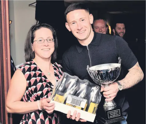  ??  ?? Jamie Rother receiving one of his many Player of the Month awards during his time with Ramsbottom United