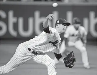  ?? FRANK FRANKLIN II/AP PHOTO ?? Jacob deGrom of the Mets delivers a pitch during the fourth inning of Tuesday’s game against the Marlins at New York. The Marlins won 5-3.