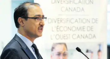  ?? JIM WELLS / POSTMEDIA NEWS ?? Federal Natural Resources Minister Amarjeet Sohi speaks to media in Calgary on Wednesday following the announceme­nt of funding for 16 innovative businesses.