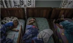  ??  ?? Kids nap at Bambi Home, Venezuela’s second-largest private orphanage, which saw requests for placements surged about 30 per cent last year.