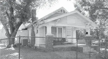  ?? KRISTI EATON/AP ?? The exterior of the home used in the 1983 film “The Outsiders,” based on S.E. Hinton’s classic 1967 novel of the same name, appears Sept. 14 in Tulsa, Okla. The home has been converted into The Outsiders House Museum.