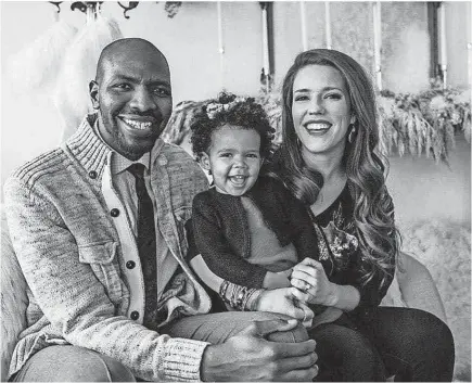  ?? COURTESY OF STAMSCHROR-LOTT FAMILY ?? Former Marquette basketball player Jamil Stamschror-Lott with daughter Zola, 2, and wife, Sara, continue to help Minneapoli­s heal with their therapy practice, even after their rented office space was badly damaged during protests.