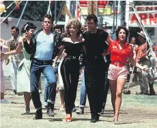  ??  ?? Grease is the word: Jeff Conaway, left, Olivia Newton-John, John Travolta and Stockard Channing star in the classic 1978 high school musical.
