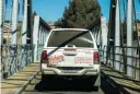  ??  ?? EASY CROSSING. Going through the border at the Peka Bridge post was an effortless affair. The vehicles are inspected for any contraband and passports are stamped without any drama. Driving from any one of the major cities in South Africa will require a...