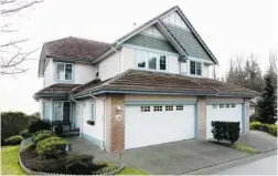  ??  ?? This end- unit townhome at 38 — 1751 Paddock Dr. in Coquitlam enjoys plenty of natural light.