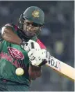  ?? — AFP ?? Bangladesh’s Imrul Kayes plays a shot during the first ODI against Zimbabwe at the Sher-e-bangla National Cricket Stadium in Dhaka.