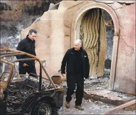  ?? Genaro Molina Los Angeles Times ?? GOV.-ELECT Gavin Newsom, left, looking at fire damage with Gov. Jerry Brown in Malibu on Saturday, has said wildfire prevention should be “a top priority.”