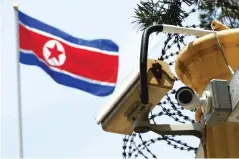  ??  ?? KUALA LUMPUR: A CCTV surveillan­ce camera is attached by the entrance gate at the North Korean Embassy monitors passersby in Kuala Lumpur, Malaysia. In the paranoid universe of North Korea, the feverish accusation­s it makes against its sworn enemies...