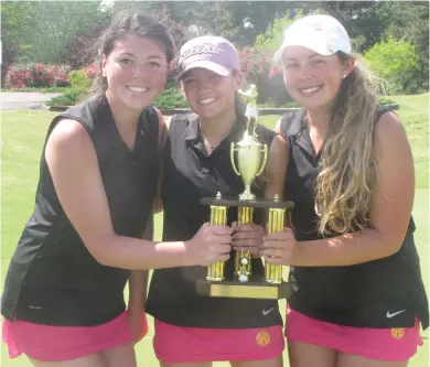  ?? (Photo by Danny P. Smith, SDN) ?? Kyra Moorhead, KB Hobart and Paige Lemm hold the Class 6A, Region 2 championsh­ip trophy on Wednesday afternoon.