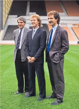  ??  ?? Jimmy Nicholl with manager, Graeme Souness, and his assistant, Walter Smith, after joining Rangers for a second spell in 1986