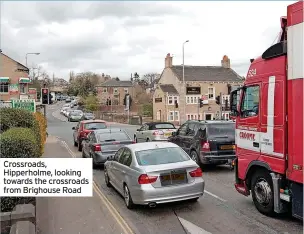  ?? ?? Crossroads, Hipperholm­e, looking towards the crossroads from Brighouse Road