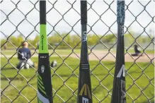  ?? LAUREN JUSTICE NEW YORK TIMES ?? USA Baseball created new standards for bat constructi­on, and the changeover has angered parents who have been shocked by the bats’ high costs — $45 to $350 — and frustrated that the demand has seemingly outstrippe­d the supply.