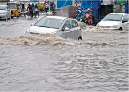  ??  ?? Heavy rainfall on Monday led to massive waterloggi­ng at the Ranigunj area in the city. — S. Surender Reddy