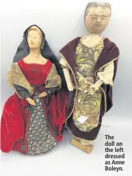  ??  ?? The doll on the left dressed as Anne Boleyn.