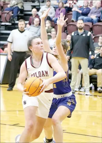  ?? Mark Ross/Special to the Herald-Leader ?? Siloam Springs senior Brooke Ross powers her way to the basket against Mountain Home on Friday, Jan. 6. Ross had a game-high 19 points as the Lady Panthers defeated the Lady Bombers 52-47.