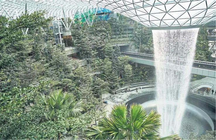  ?? PHOTOS BY BLOOMBERG ?? The Jewel Changi Airport is one of many Singapore landmarks built by Woh Hup Holdings Pte.