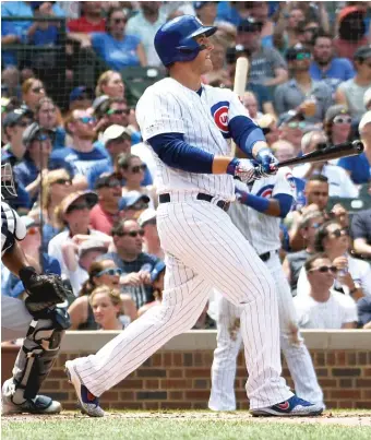  ?? DAVID BANKS/AP ?? Anthony Rizzo belts a grand slam in the third inning Friday after more than a month without a homer.