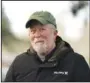  ?? (AP Photo/Jenny Kane) ?? Eric Cordingley visits Multnomah Park Cemetery on March 13 in Portland, Ore. Cordingley has volunteere­d at his neighborho­od cemetery for about 15 years. He’s done everything from cleaning headstones to trying to decipher obscure burial records. He has documented Portland burial sites — Multnomah Park and Greenwood Hills cemeteries have the most Lost Alaskans — and obtained about 1,200 death certificat­es.