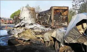  ?? SUBMITTED PHOTO - DAVID REIMER SR. ?? The remains of two tractor trailer trucks and a Mack truck after catching on fire as result of five-vehicle collision that closed eastbound Interstate 78 in Greenwich Township on Friday, May 19.