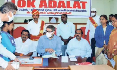  ?? ?? AT A LOK ADALAT in a District Court in Sangareddy district, Telangana.