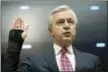  ?? CLIFF OWEN — THE ASSOCIATED PRESS ?? Wells Fargo CEO John Stumpf is sworn in on Capitol Hill in Washington, Thursday prior to testifying before the House Financial Services Committee investigat­ing Wells Fargo’s opening of unauthoriz­ed customer accounts.