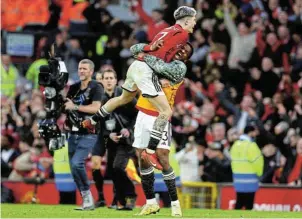  ?? /Molly Darlington/Reuters ?? Victorious: Manchester United’s Alejandro Garnacho and Willy Kambwala celebrate after beating Liverpool at Old Trafford on Sunday.