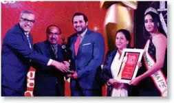  ??  ?? The award was given to Paradise Village Beach Resort, Goa and, received by Rishi Dandona, Managing Director and Mona Dandona, Chairman
