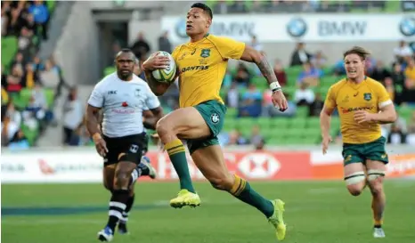  ?? PHOTO: JOE CASTRO/AAP ?? DOMINANT FORCE: Israel Folau was one of the Wallabies’ best against Fiji.