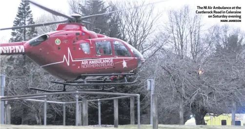  ?? MARK JAMIESON ?? The NI Air Ambulance at the Castlerock Road in Coleraine
on Saturday evening