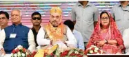  ?? PTI ?? BJP President Amit Shah with Rajasthan CM Vasundhara Raje on Saturday