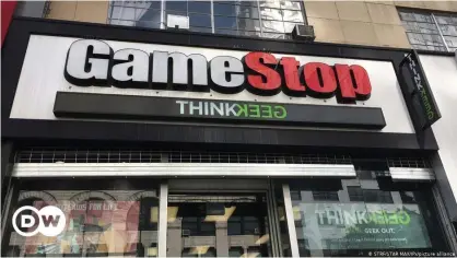  ??  ?? The ageing bricks-and-mortar video game store is at the center of a fight between amateur traders and profession­als on Wall Street