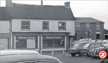  ??  ?? New Rents junction with Forge Lane, 1971 An extremely rare view showing the former premises of Record Corner prior to their moving to the more familiar High Street premises which later became the home of Our Price. The illustrate­d premises originally...