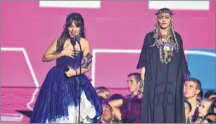  ?? AP PHOTO ?? Camila Cabello, left, accepts the award for video of the year as presenter Madonna looks on at the MTV Video Music Awards at Radio City Music Hall on Monday, Aug. 20, 2018, in New York.