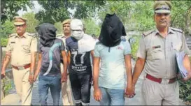  ?? PTI ?? Police take the three suspects to a court in Manesar on Thursday.