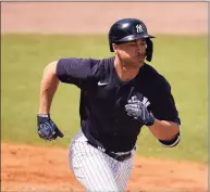  ?? Gene J. Puskar / Associated Press ?? The Yankees’ Giancarlo Stanton runs to first base during a spring training game against the Phillies on March 15.