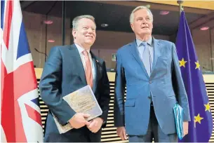  ?? AFP ?? European Union chief Brexit negotiator Michel Barnier, right, and his British counterpar­t, David Frost, pose for a photograph in Brussels in March.