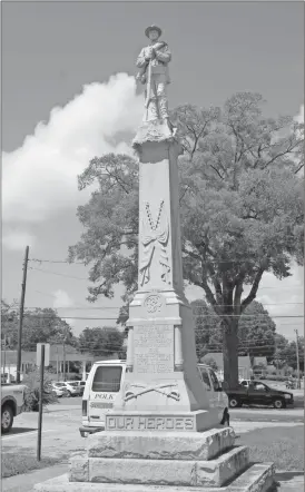  ?? Kevin Myrick/ Standard Journal ?? The Confederat­e veterans memorial in Polk County was erected in 1906 and sits on the courthouse lawn in between County Courthouse No. 1 and Courthouse No. 2.