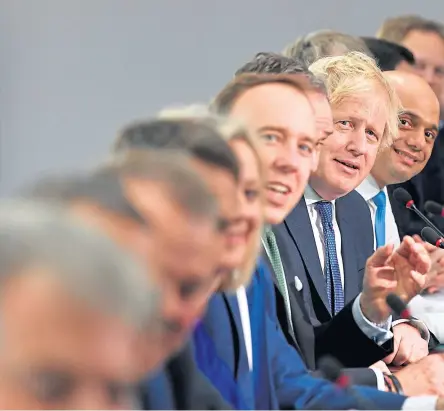  ??  ?? Prime Minister Boris Johnson, centre, chairs a Cabinet meeting at the National Glass Centre in Sunderland, a city which voted overwhelmi­ngly to leave the European Union. Picture: PA.