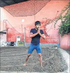  ?? TWITTER ?? Bajrang Punia (65kg) was working out in mud pits and wrestling at home with Asian Championsh­ip silver medallist Jitender Kumar (74kg) to keep himself fit during the lockdown.