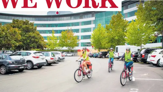  ??  ?? An atrium cafe, games area and e-bikes for staff are among the features of Vodafone’s new North Shore HQ. Photos / Shamanth Gounder