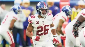  ?? Ashley Landis / Associated Press ?? Giants running back Saquon Barkley runs a route against the Chargers on Sunday.