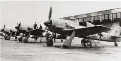  ??  ?? Late 1944: Fw 190G-8s on the delivery line at the Focke-Wulf plant. This model had a strengthen­ed landing gear and could carry 2,200 pounds of bombs for 510 miles. (Photo courtesy of Luftwaffe via author)