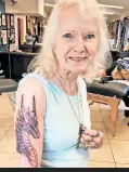  ??  ?? DRAGON LADY: Mary Ellen, 79, rocks a mystical beast tat she got at Hudson Valley Tattoo.